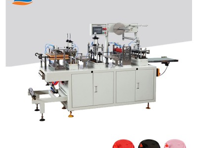 Plastic lid forming machine / 2